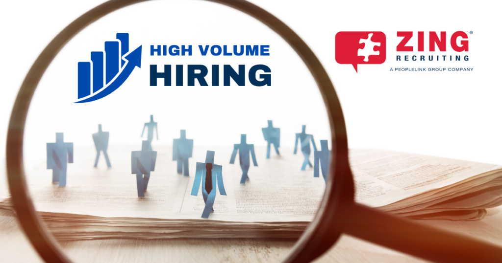 looking through magnifying glass showing lots of people icons and words: "high volume hiring"